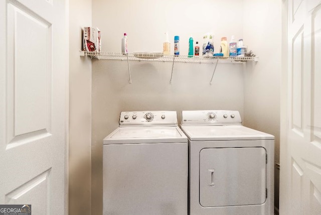 laundry room featuring independent washer and dryer