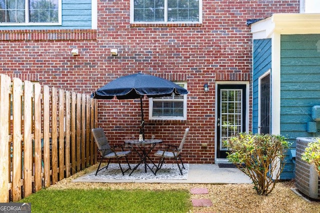 view of patio with central AC