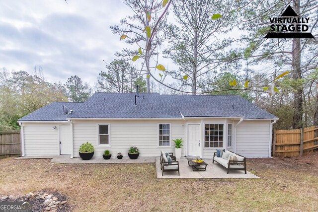 rear view of house with a patio area