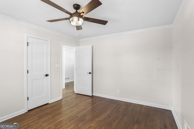 unfurnished bedroom with dark wood-type flooring, crown molding, and ceiling fan