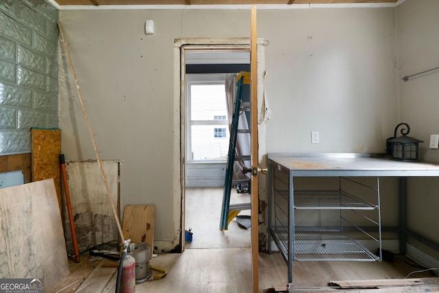 miscellaneous room with wood-type flooring