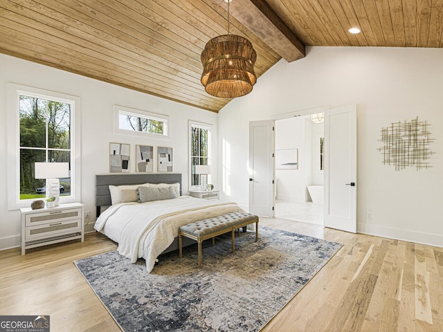 bedroom with vaulted ceiling with beams, connected bathroom, light hardwood / wood-style flooring, and wooden ceiling