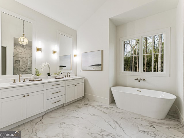 bathroom with vanity, vaulted ceiling, and plus walk in shower