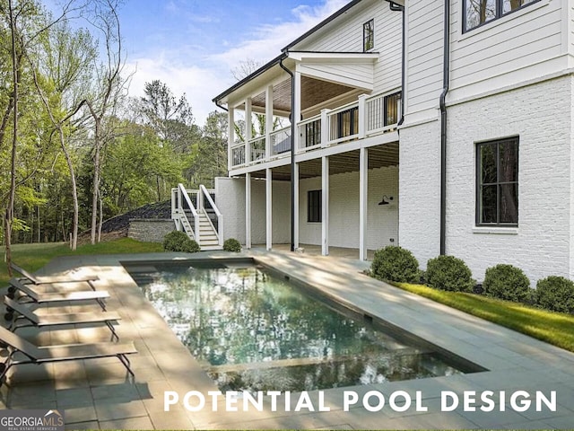 view of pool with a deck