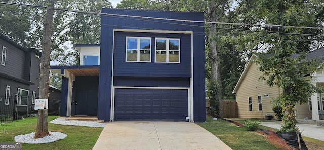 view of front of home featuring central AC unit, a garage, and a front lawn