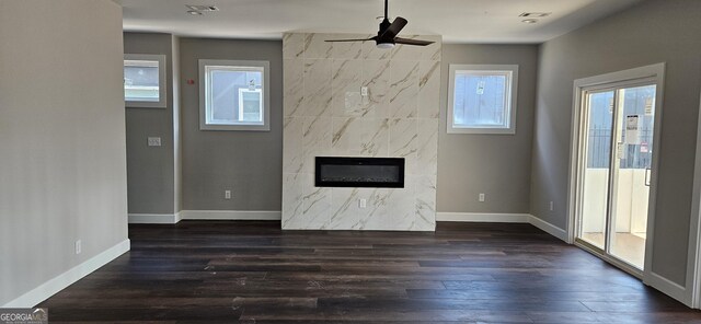 kitchen featuring sink, white cabinetry, tasteful backsplash, dark hardwood / wood-style floors, and ceiling fan