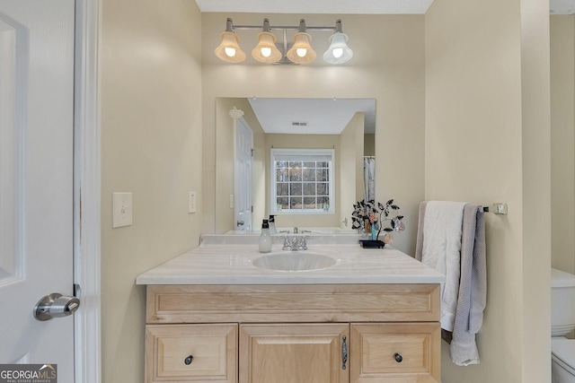 5833 Westerling Pl, Powder Springs, GA 30127 - bathroom featuring vanity and toilet