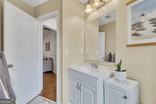 5833 Westerling Pl, Powder Springs, GA 30127 - bathroom with vanity and baseboards