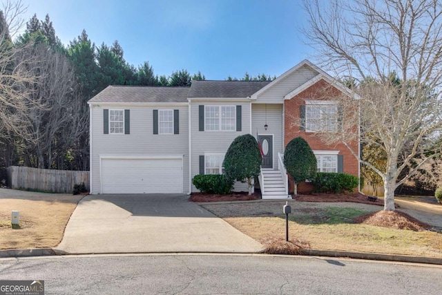 view of front of home with a garage