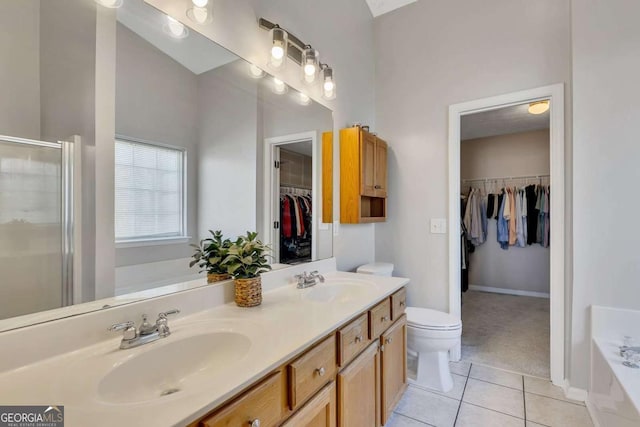 full bathroom featuring tile patterned flooring, vanity, toilet, and plus walk in shower