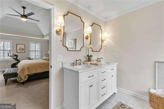 bathroom featuring crown molding, ceiling fan, vanity, and a raised ceiling