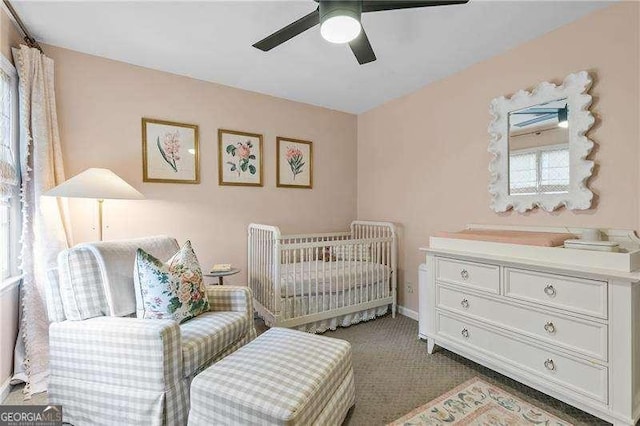 carpeted bedroom featuring ceiling fan