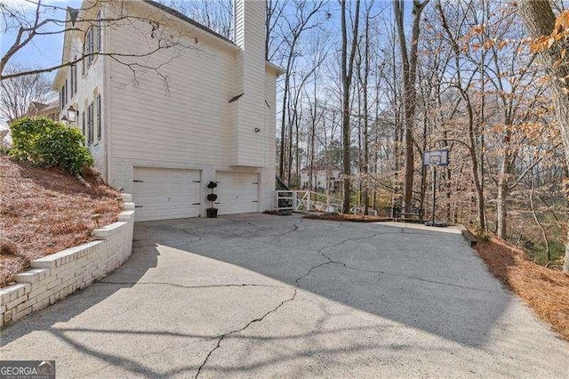 view of home's exterior with a garage