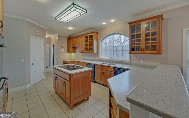 kitchen with a kitchen island, glass insert cabinets, light countertops, and a sink