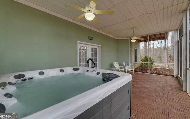 sunroom / solarium featuring wooden ceiling and a hot tub