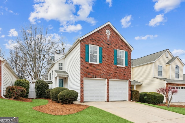 front of property with a garage and a front lawn