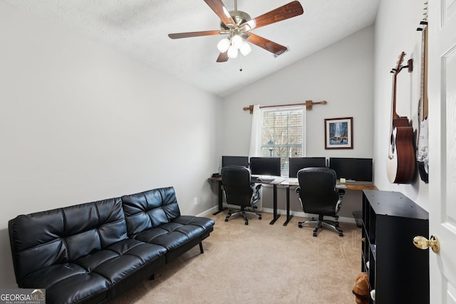 office space with ceiling fan, lofted ceiling, light carpet, and a textured ceiling