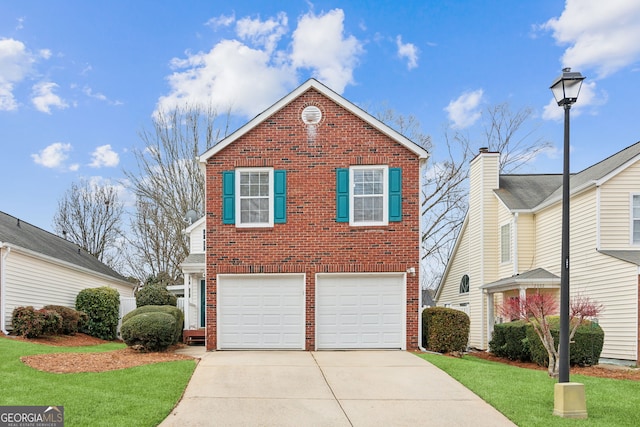 front facade featuring a garage and a front lawn