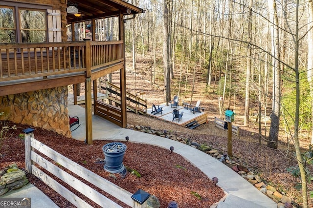 view of yard featuring a wooden deck