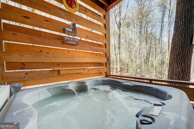 exterior space with a jacuzzi