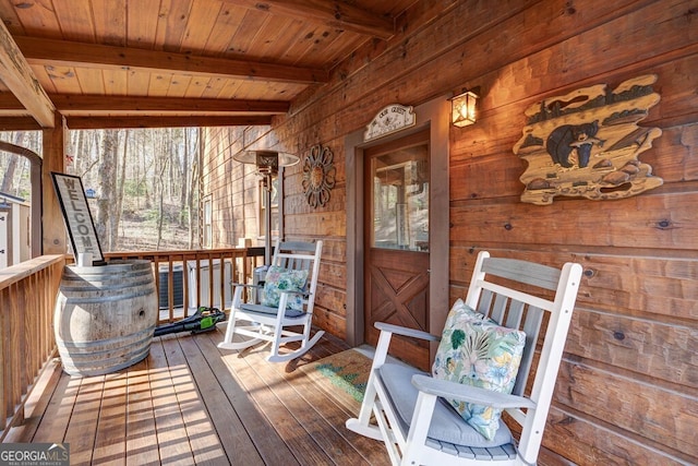 wooden deck featuring covered porch