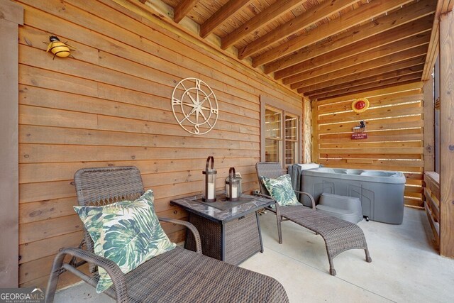 view of patio / terrace featuring a hot tub