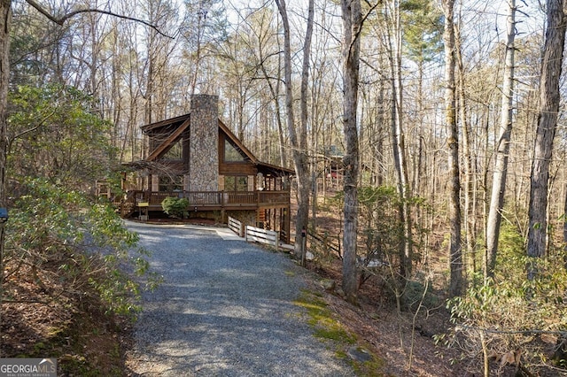 view of home's exterior featuring a deck