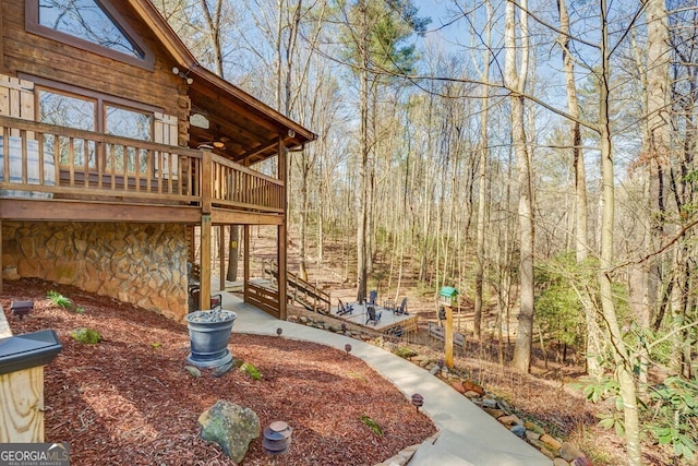 view of yard with a deck