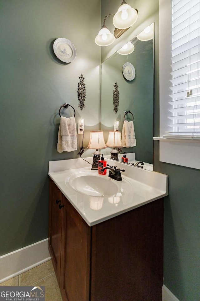 bathroom featuring tile patterned floors and vanity