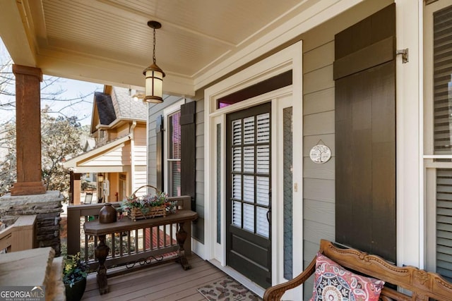 doorway to property with a porch