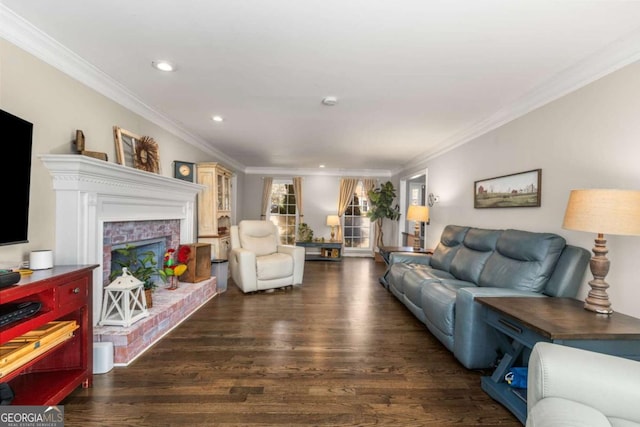 living room featuring dark hardwood / wood-style flooring and ornamental molding