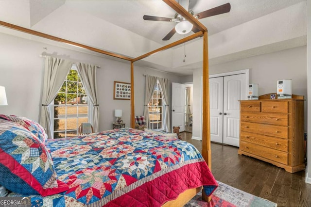 bedroom with ceiling fan, dark hardwood / wood-style floors, and a closet