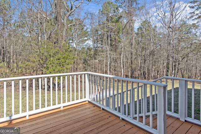 deck featuring a yard