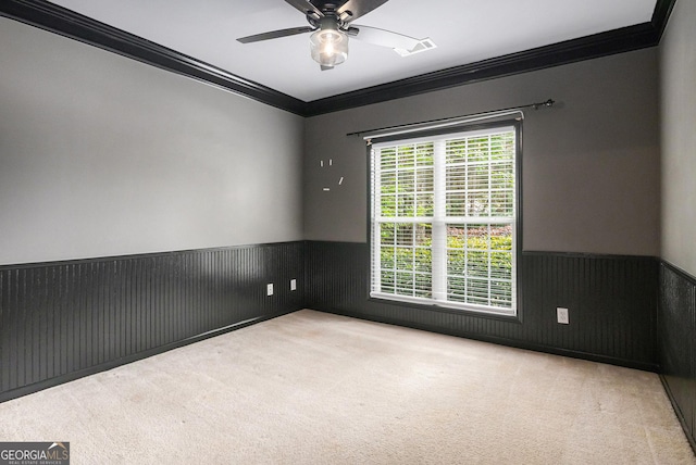 2753 Jubilee Ter, Bethlehem, GA 30620 - empty room featuring crown molding, wainscoting, carpet flooring, and a ceiling fan