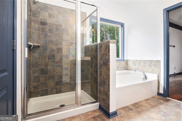 2753 Jubilee Ter, Bethlehem, GA 30620 - bathroom with a bath and a shower stall