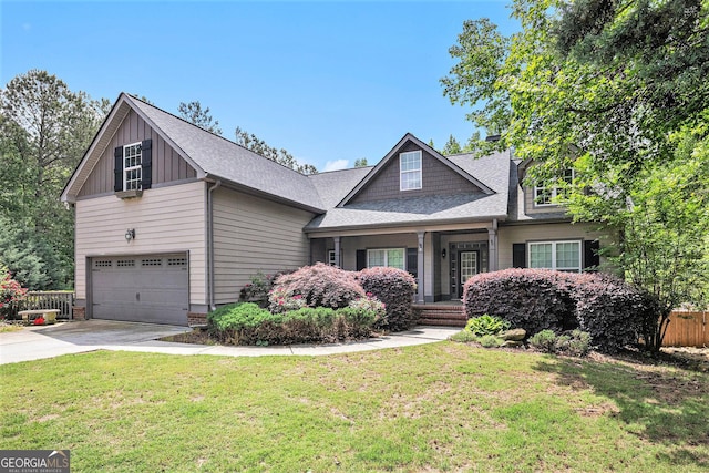 2753 Jubilee Ter, Bethlehem, GA 30620 - craftsman inspired home featuring concrete driveway, an attached garage, board and batten siding, and roof with shingles