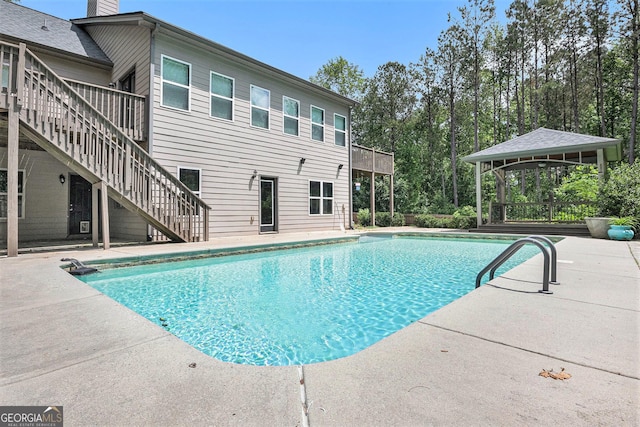 2753 Jubilee Ter, Bethlehem, GA 30620 - swimming pool with a gazebo, stairway, a wooden deck, and a patio