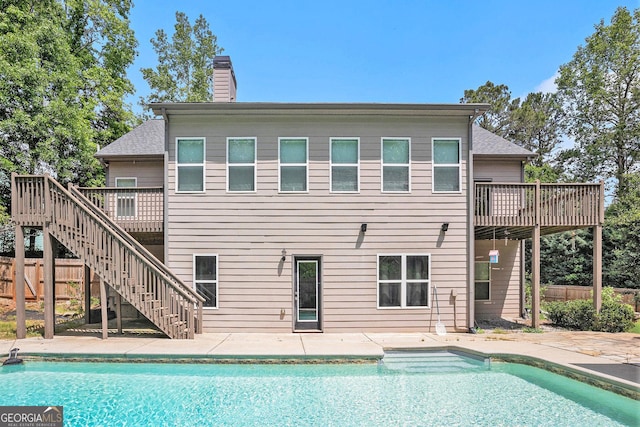 2753 Jubilee Ter, Bethlehem, GA 30620 - view of pool with stairs, a wooden deck, and a patio area