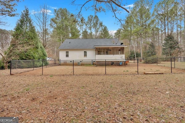 rear view of house with a sunroom