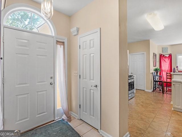 foyer with light tile patterned floors