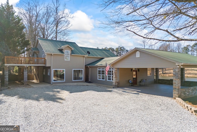 view of front of house with a carport