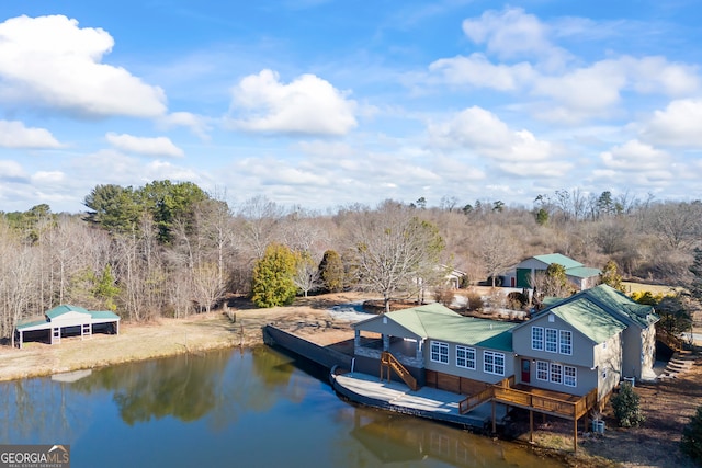 dock area featuring a deck with water view