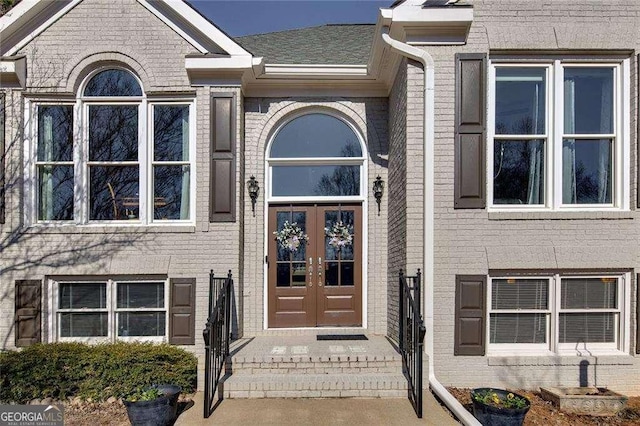 entrance to property featuring french doors