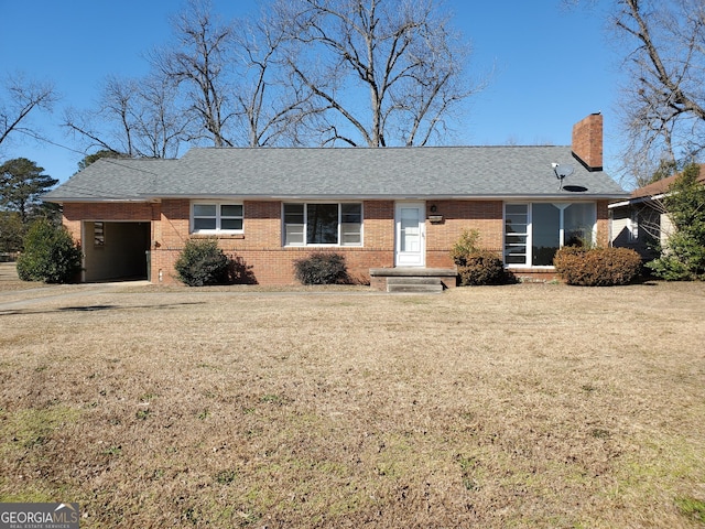 ranch-style home featuring a front yard