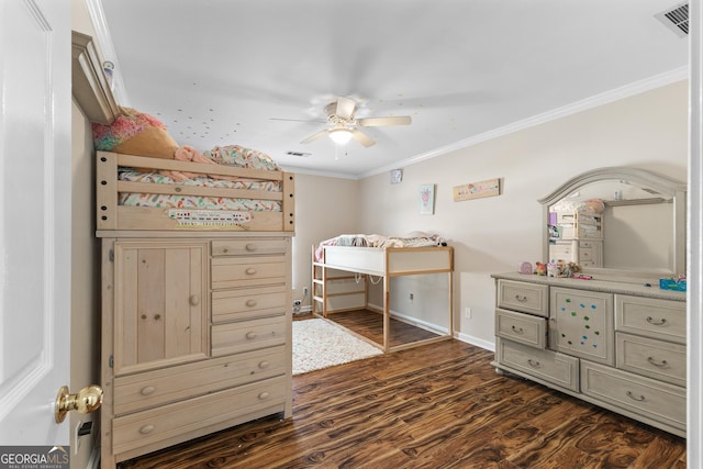 bedroom with crown molding, ceiling fan, and dark hardwood / wood-style floors