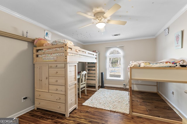 bedroom with ceiling fan, ornamental molding, and dark hardwood / wood-style flooring