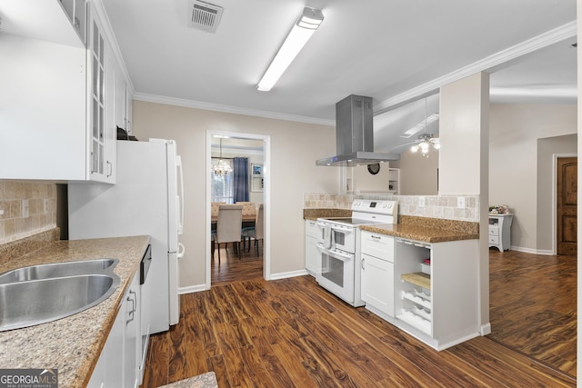 kitchen with dark wood-type flooring, white cabinetry, double oven range, island range hood, and ornamental molding