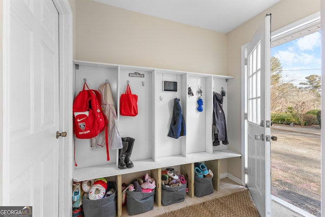 mudroom with tile patterned flooring