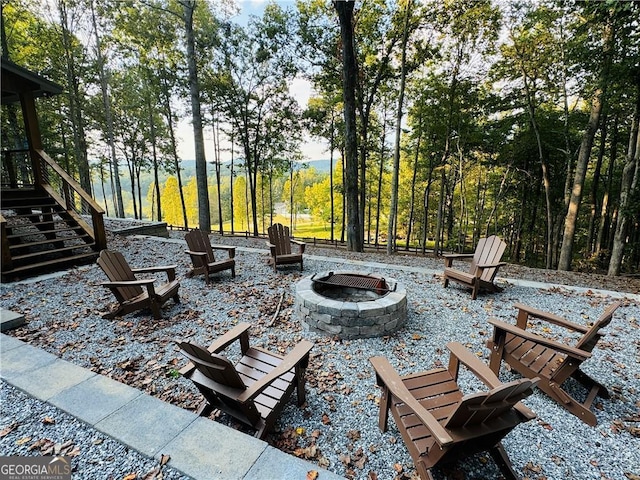 view of patio featuring an outdoor fire pit