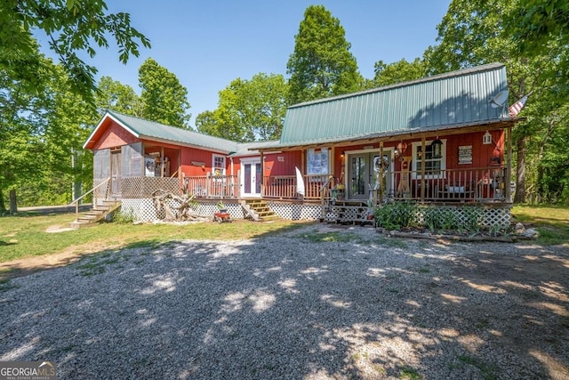 view of front of property featuring covered porch